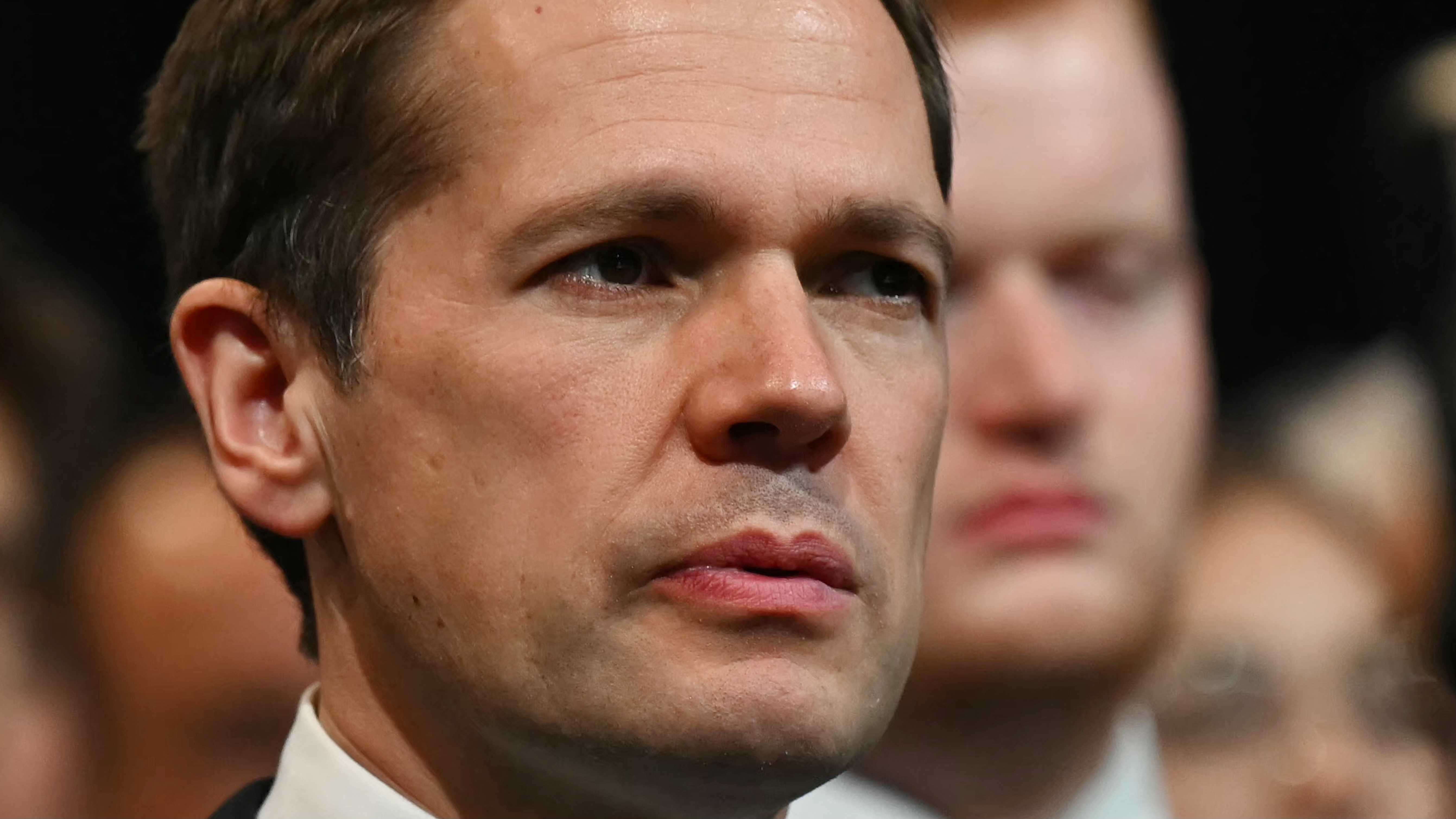 Robert Jenrick listens to Tory leader Kemi Badenoch deliver her speech on the final day of the annual party conference in Manchester in October 2025. (AFP)