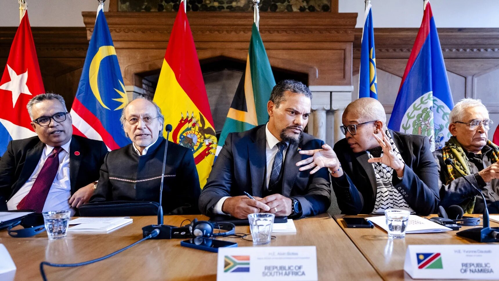 Alvin Botes (C), South Africa's Deputy Minister of International Relations and Cooperation and Yvonne Dausab (2-R), Minister of Justice of Namibia take part in a press conference of the "Progressive International" international political organisation and The Hague Group in The Hague on 31 January 2025 (AFP)