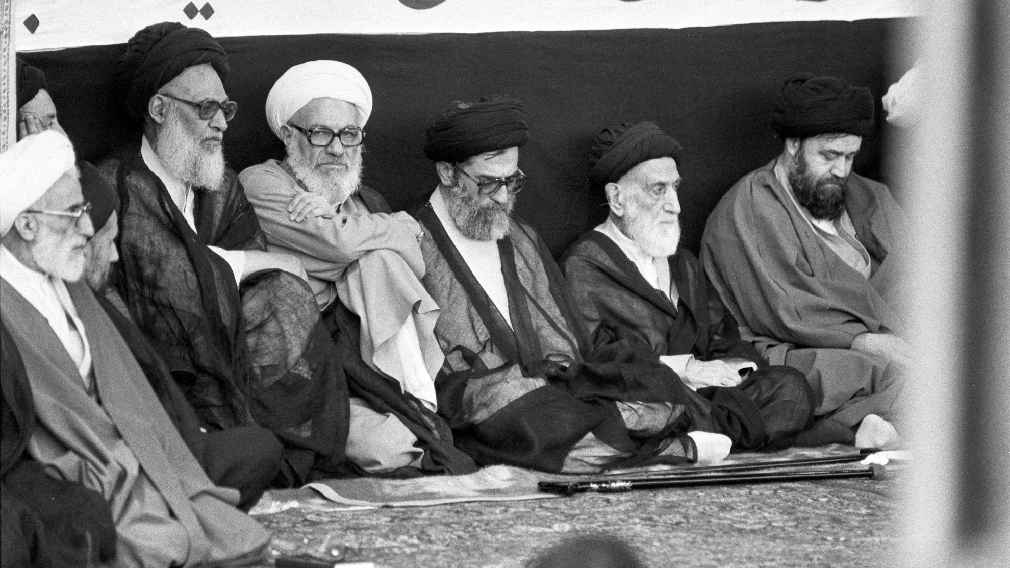 Ali Khamenei attends a memorial service for the late Ayatollah Ruhollah Khomeini alongside senior officials including Ayatollah Azari Ghomi in Tehran, 7 June 1989 (Reuters)