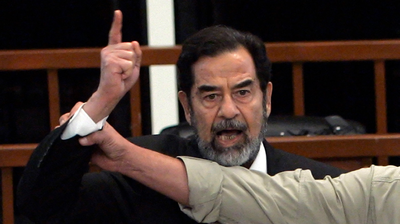 Former Iraqi Saddam Hussein stands trial in Baghdad in December 2006 (AFP)