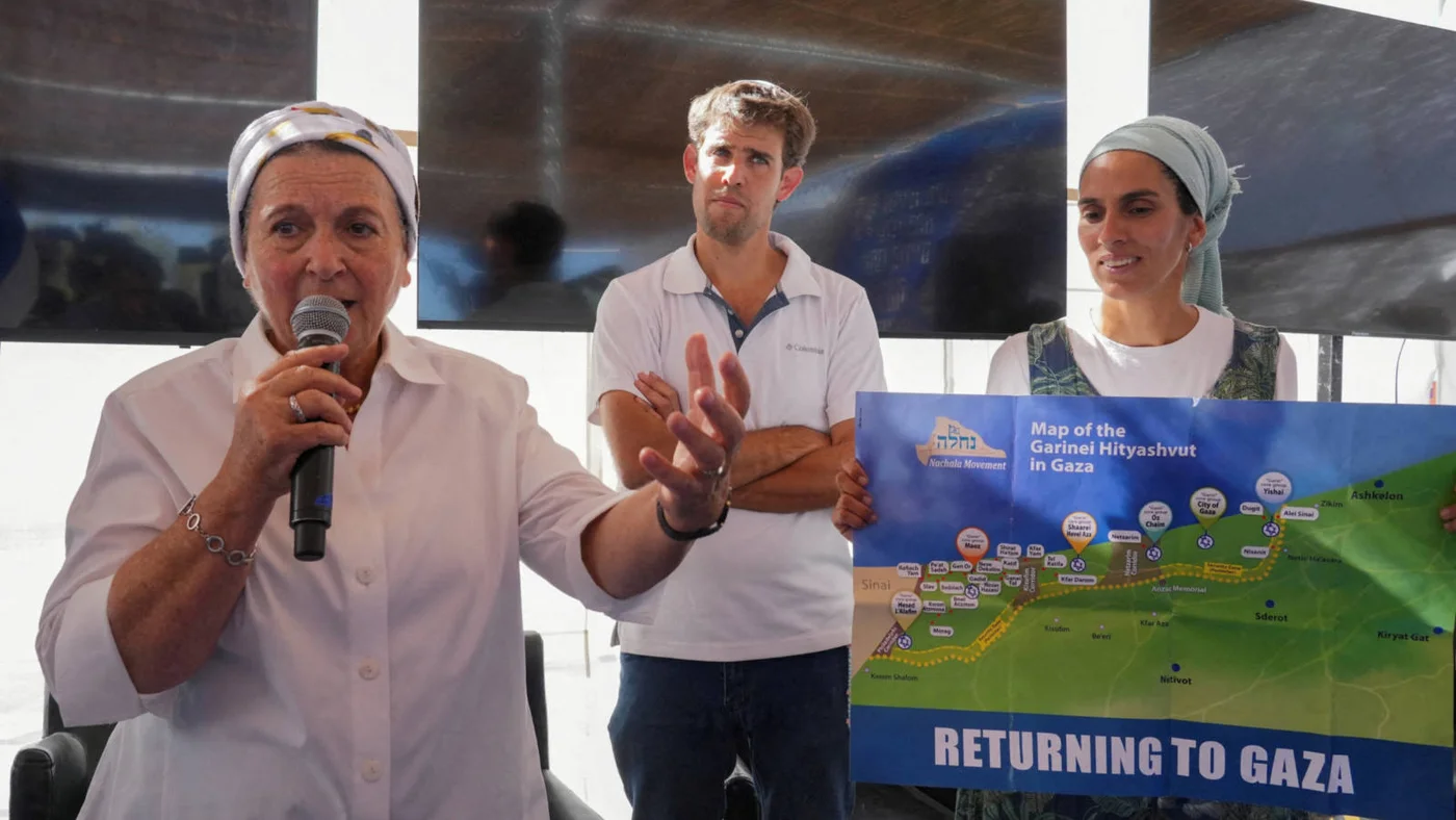 Daniella Weiss (left), founder of Nachala, an Israeli settlers organisation, speaks during a conference on the resettlement of the Gaza Strip, in Be'eri, southern Israel in October 2024 (Reuters)