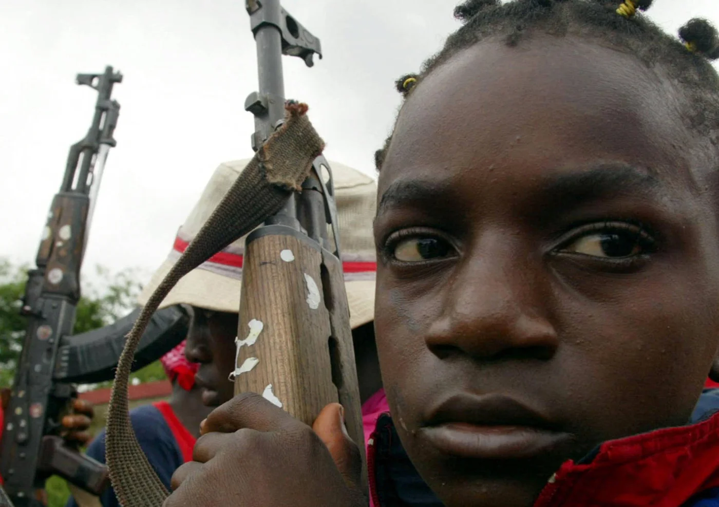 A 13-year-old fighting for Liberian President Charles Taylor: in 2012 Taylor was found guilty of the war crime of using child soldiers (AFP)