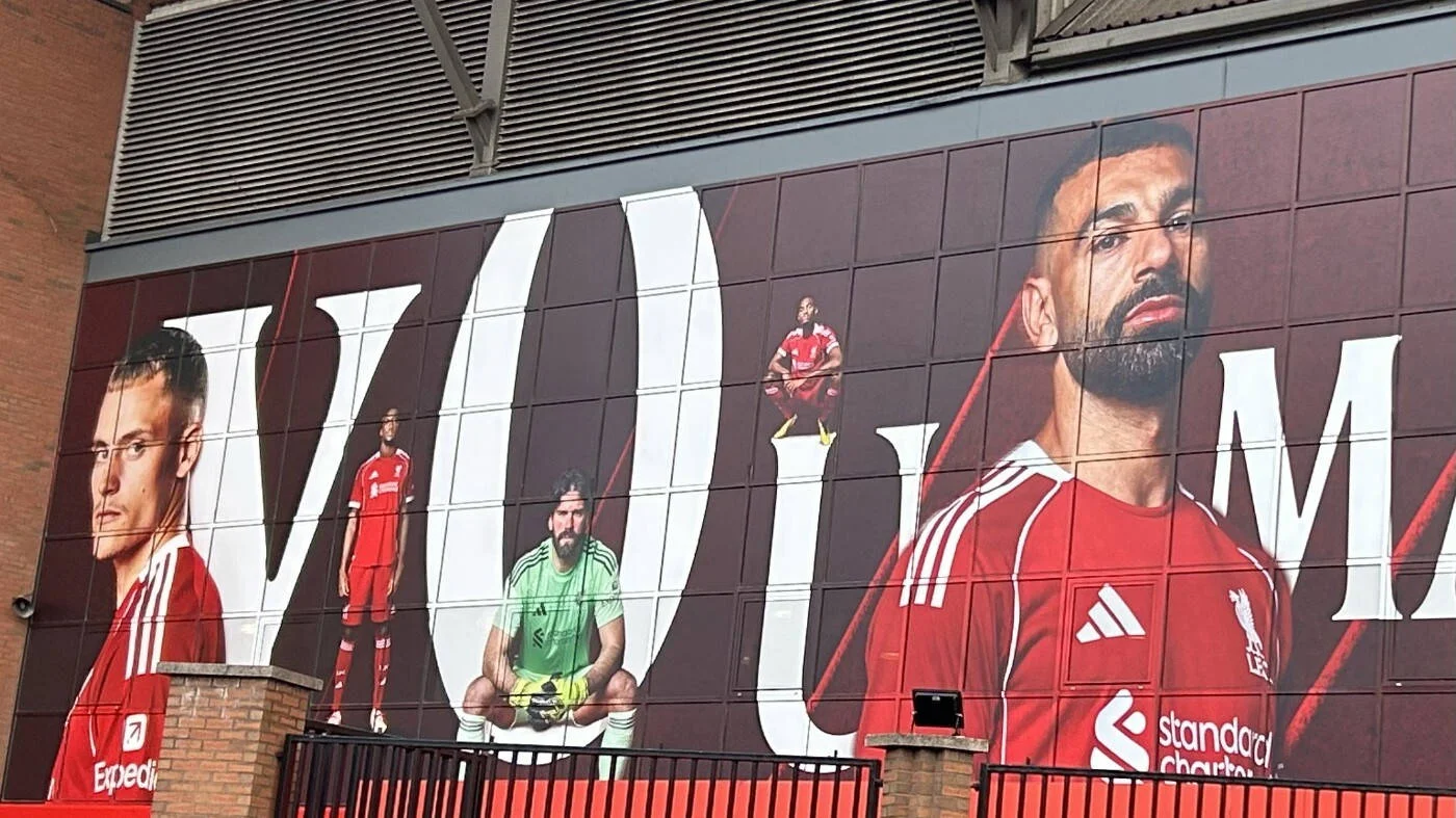 Liverpool players, including Florian Wirtz (l) and Mohammed Salah (r), on the side of Anfield stadium, 13 December 2025 (Oscar Rickett/MEE)