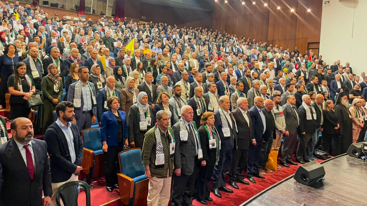 Palestinians attend a ceremony in Ramallah, occupied West Bank, marking the 21st anniversary of the arrest of Marwan, in May 2023 (AFP)