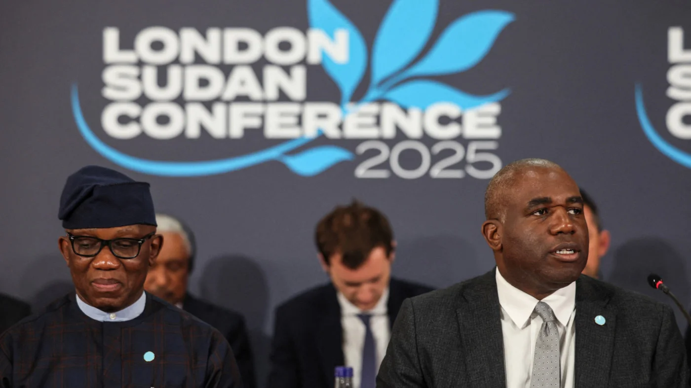 UK Foreign Secretary David Lammy (right) delivers opening remarks next to Bankole Adeoye, African Union Commissioner for Political Affairs, Peace and Security, at the London Sudan Conference 2025 on 15 April 2025 (AFP)